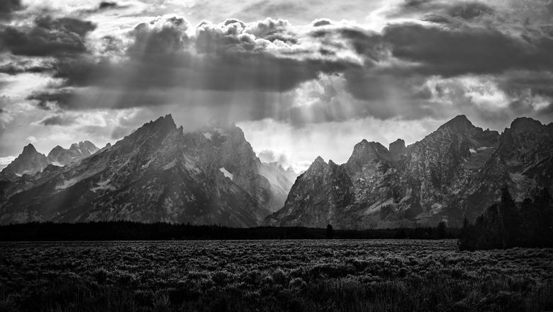 Grand Teton mountain range in black and white.