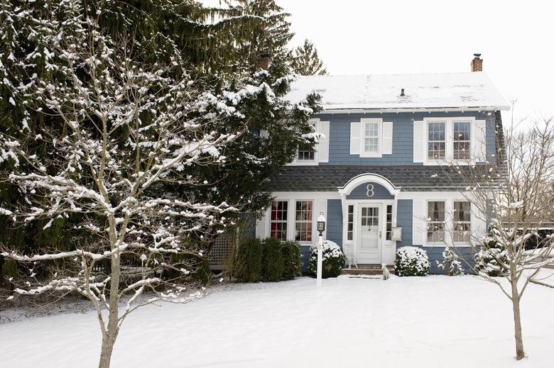  House with Snow in Winter