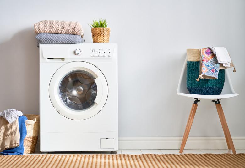 Laundry room with a washing machine.