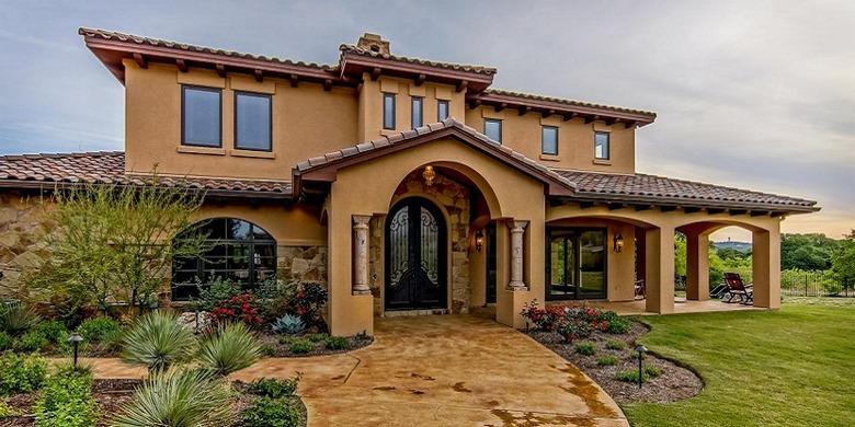 Mission-style house with a clay tile roof.