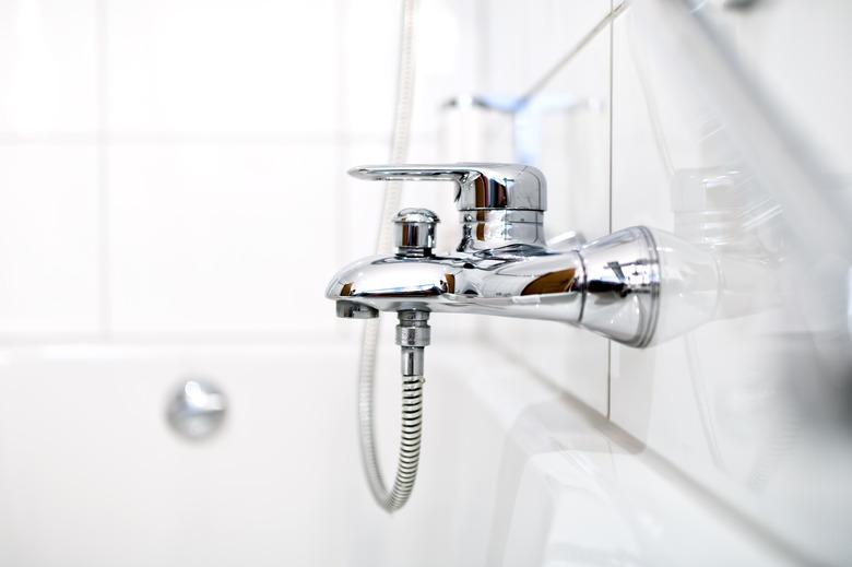 close up of luxury bathroom tap and bathtub