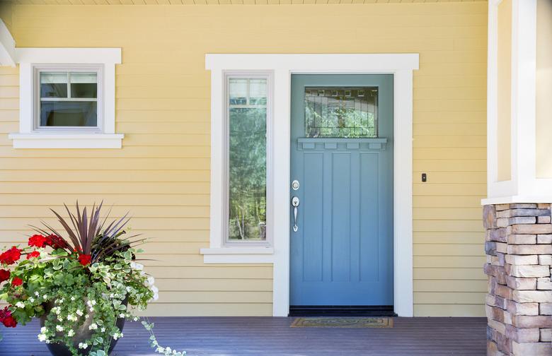 Front entrance of a home with blue door