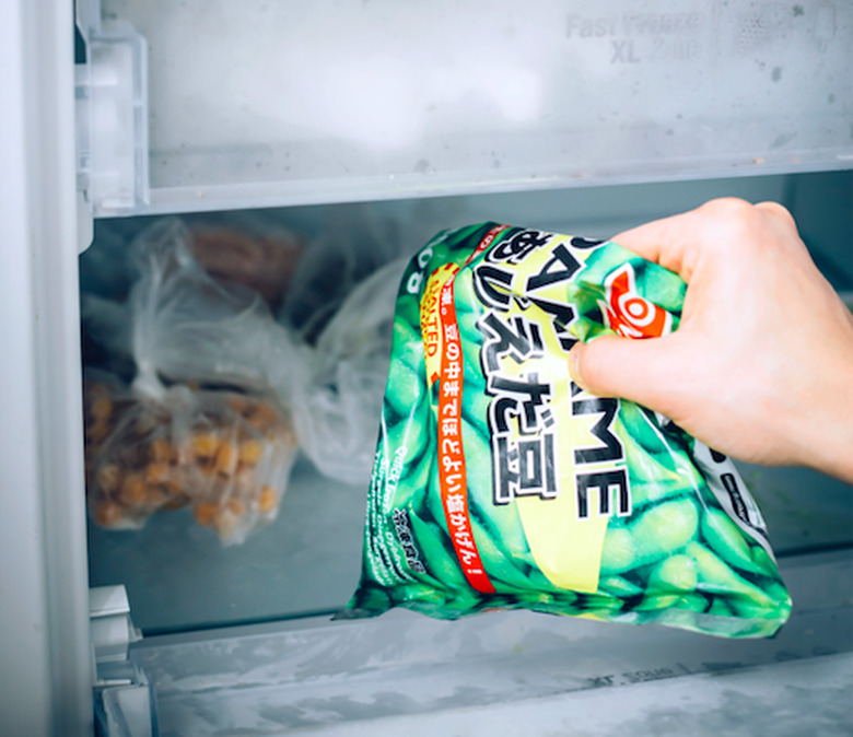 Putting food into freezer