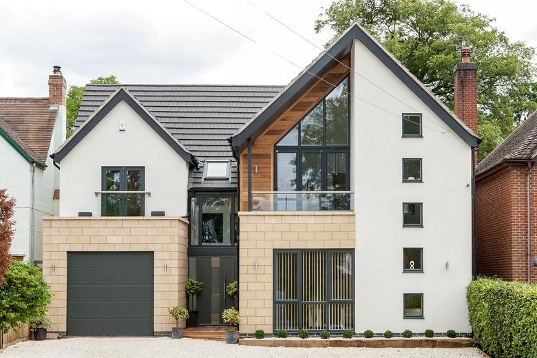 sleek flush panel modern garage doors on modern house