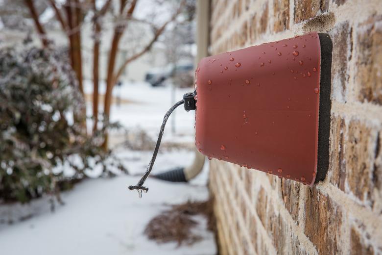 Outdoor faucet cover in winter.