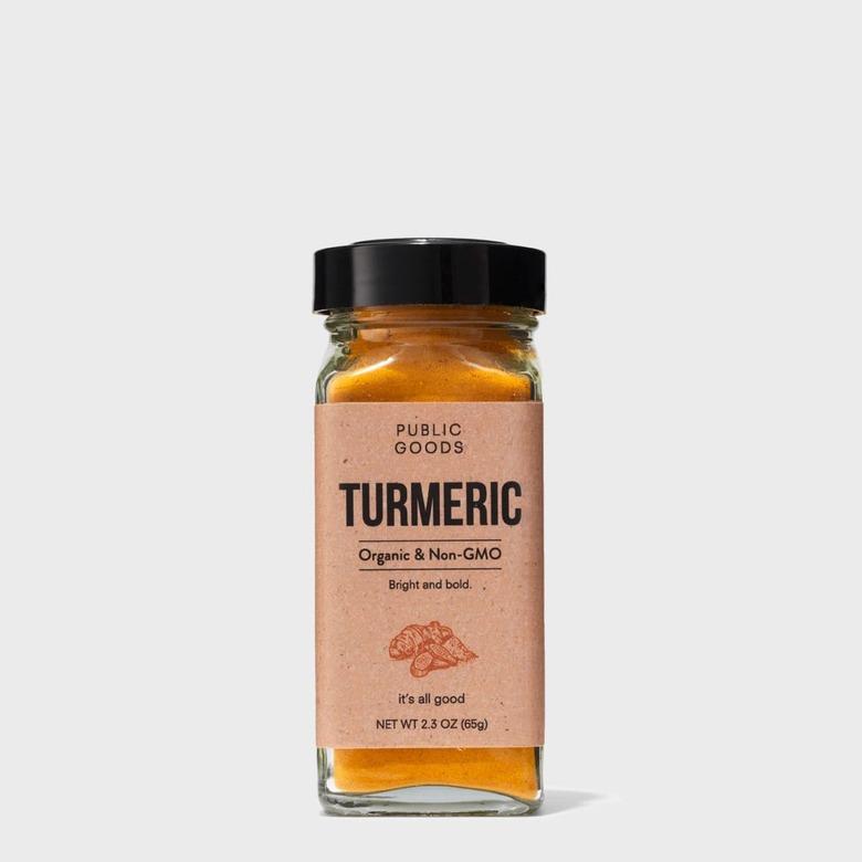 public goods powdered turmeric in spice jar