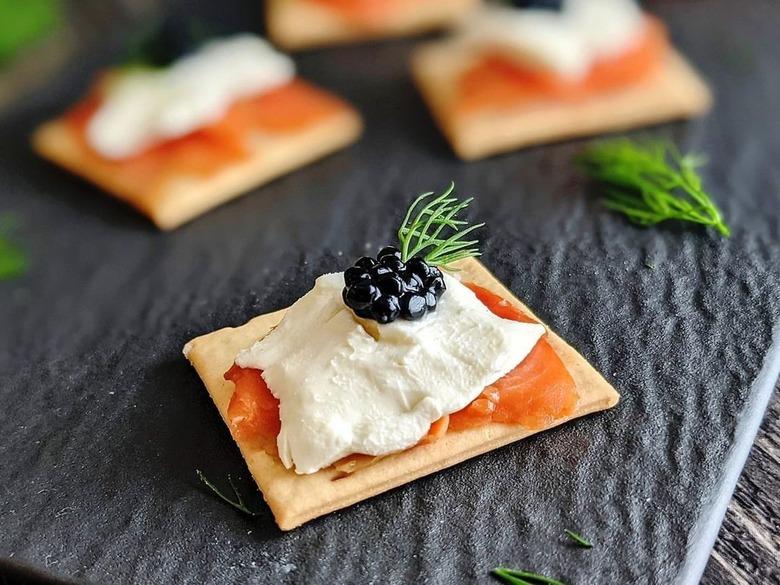 smoked salmon and caviar on crackers