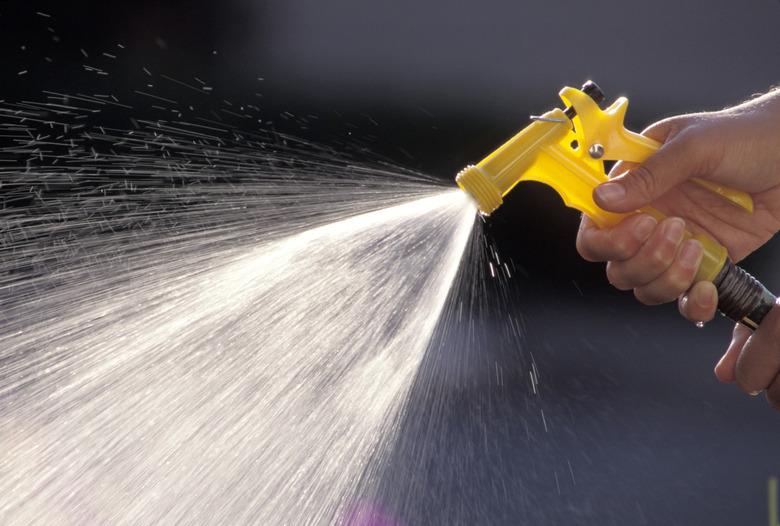 Spraying a Garden Hose