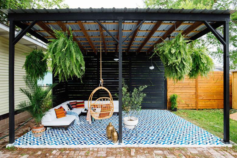 Pergola with blue-painted concrete floor