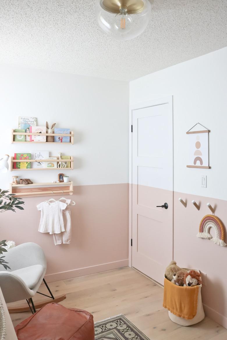 pink and white nursery idea with color blocking and flush mount ceiling fixture