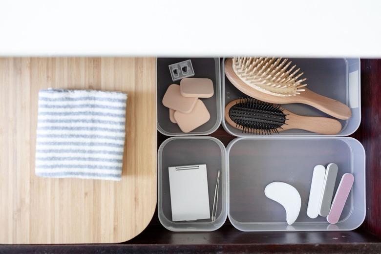 bathroom drawer dividers with hairbrush and nail file