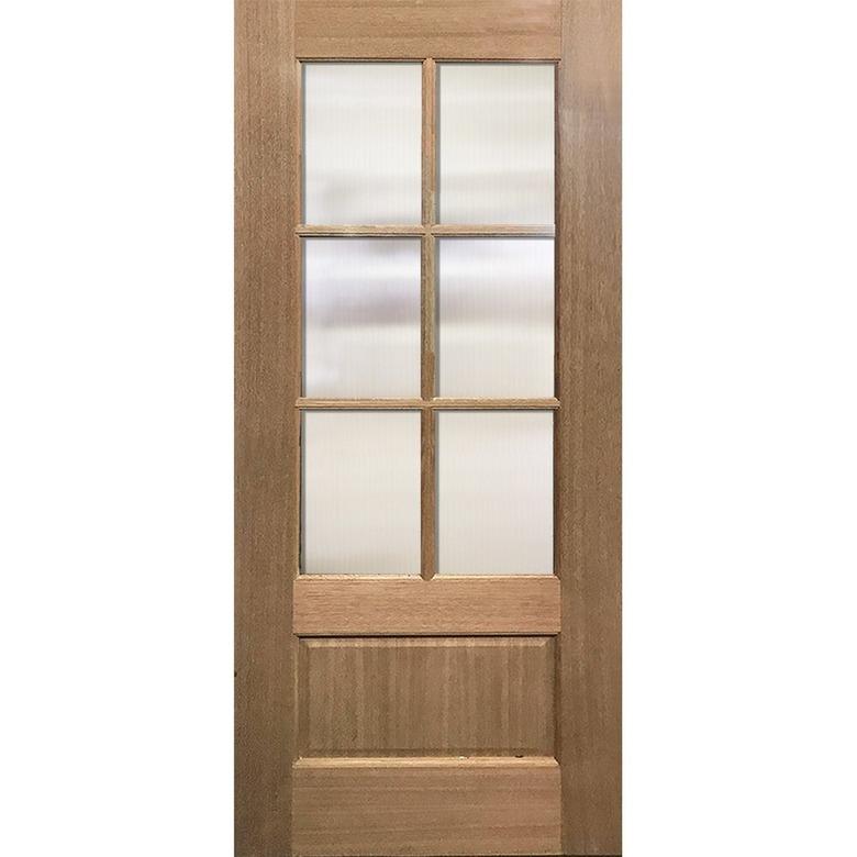 A wooden slab door with clear glass