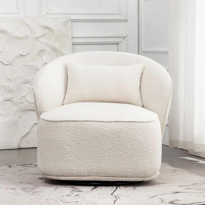 Orren Ellis Iyoni Bouclé Swivel Barrel Chair