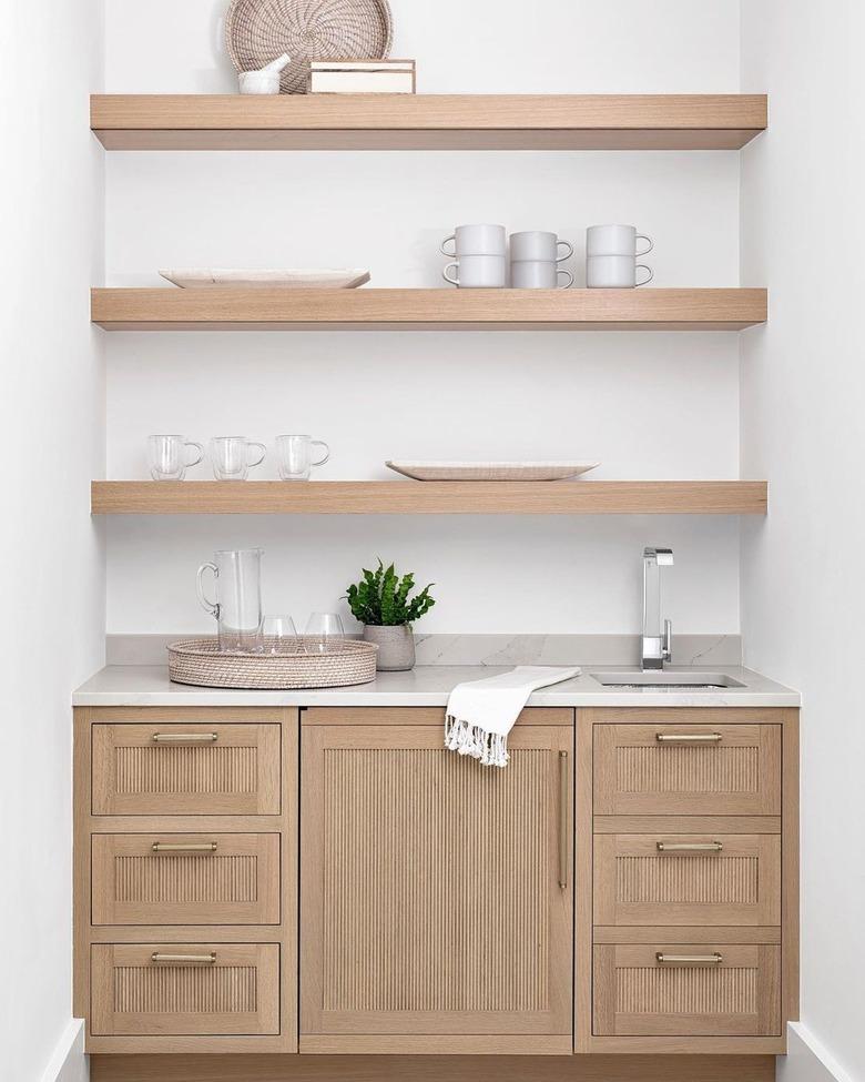 reeded cabinets and drawers in wood breakfast bar