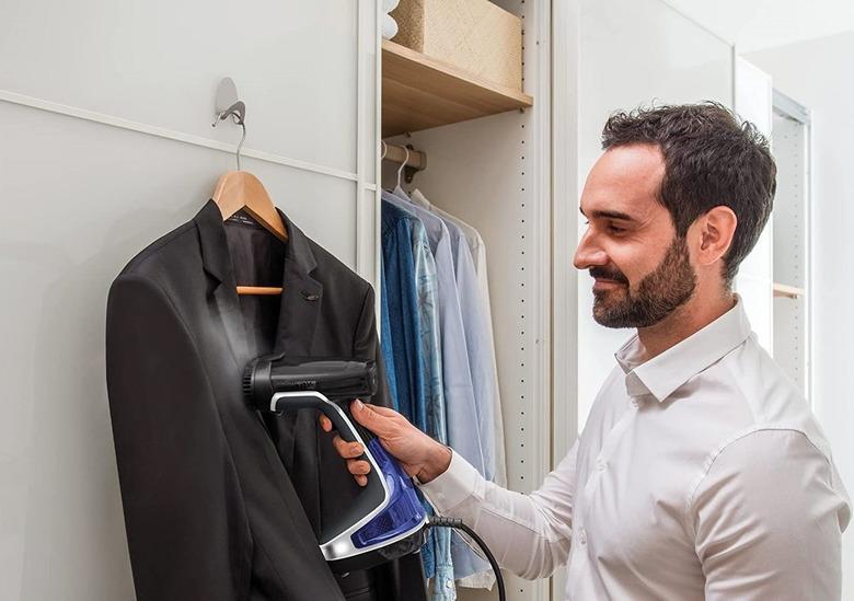 Using a Rowenta X-Cel handheld steamer.