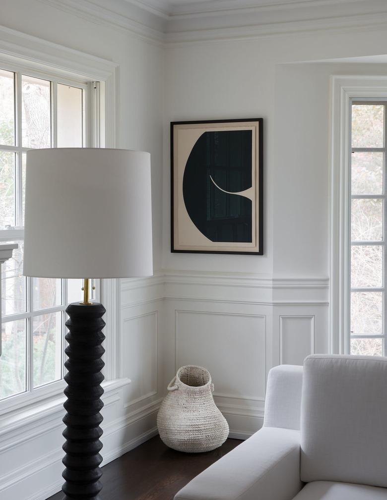 white Scandinavian living room with black decorative accents