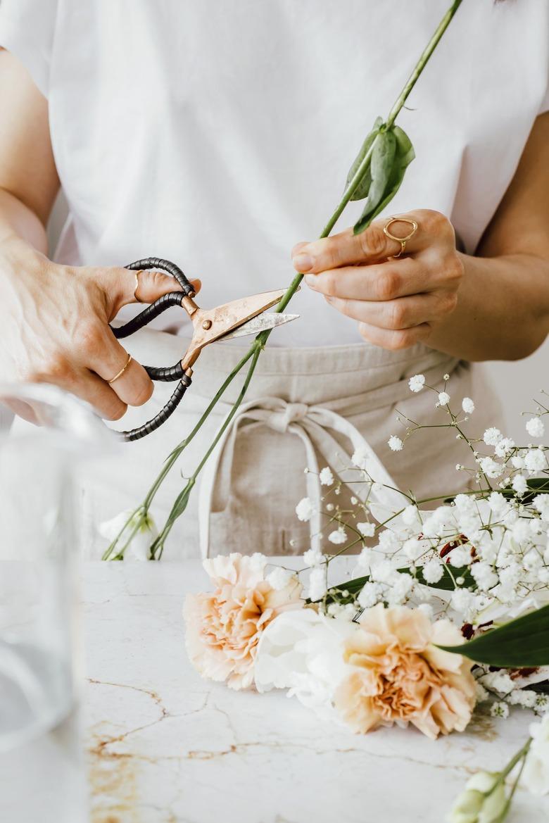 Cut at least 1/2 inch off the ends of the flowers