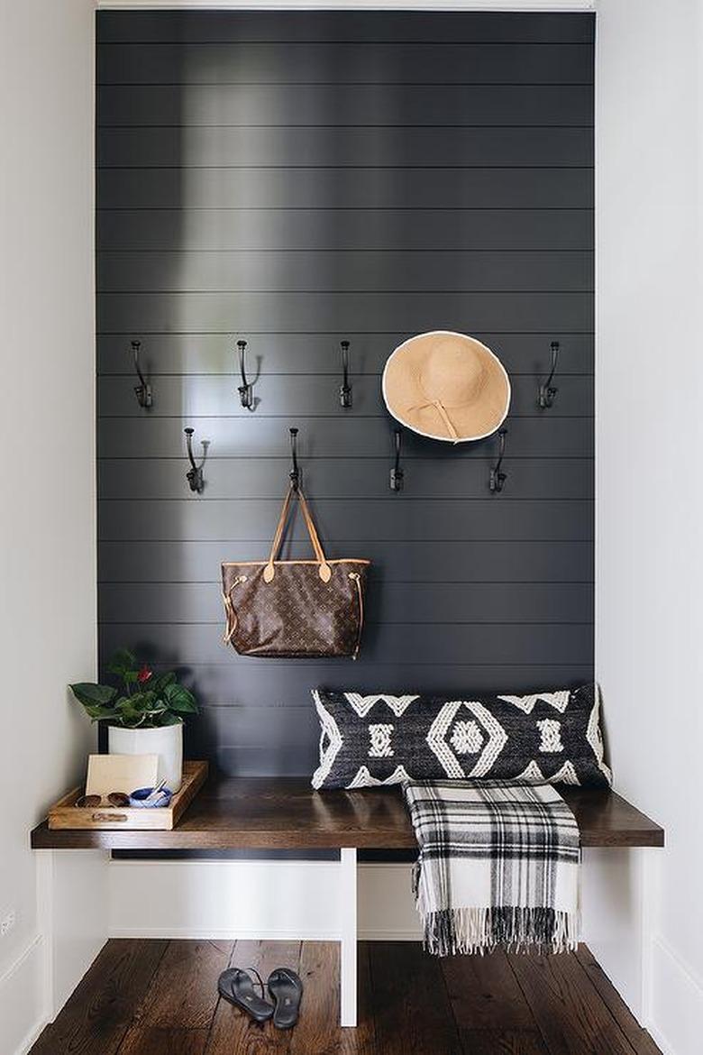 Shiplap hallway accent wall in entryway by Amy Storm & Co.