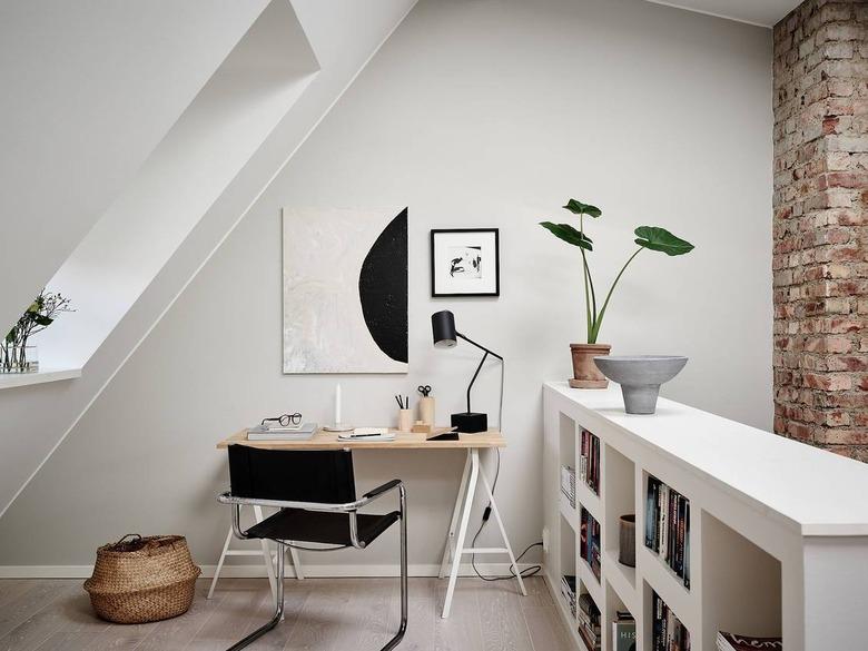 small attic library in home office with bookcase