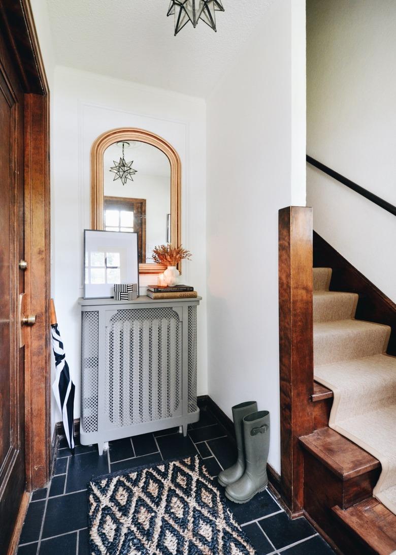 Small entryway with mirror designed by Francois et Moi