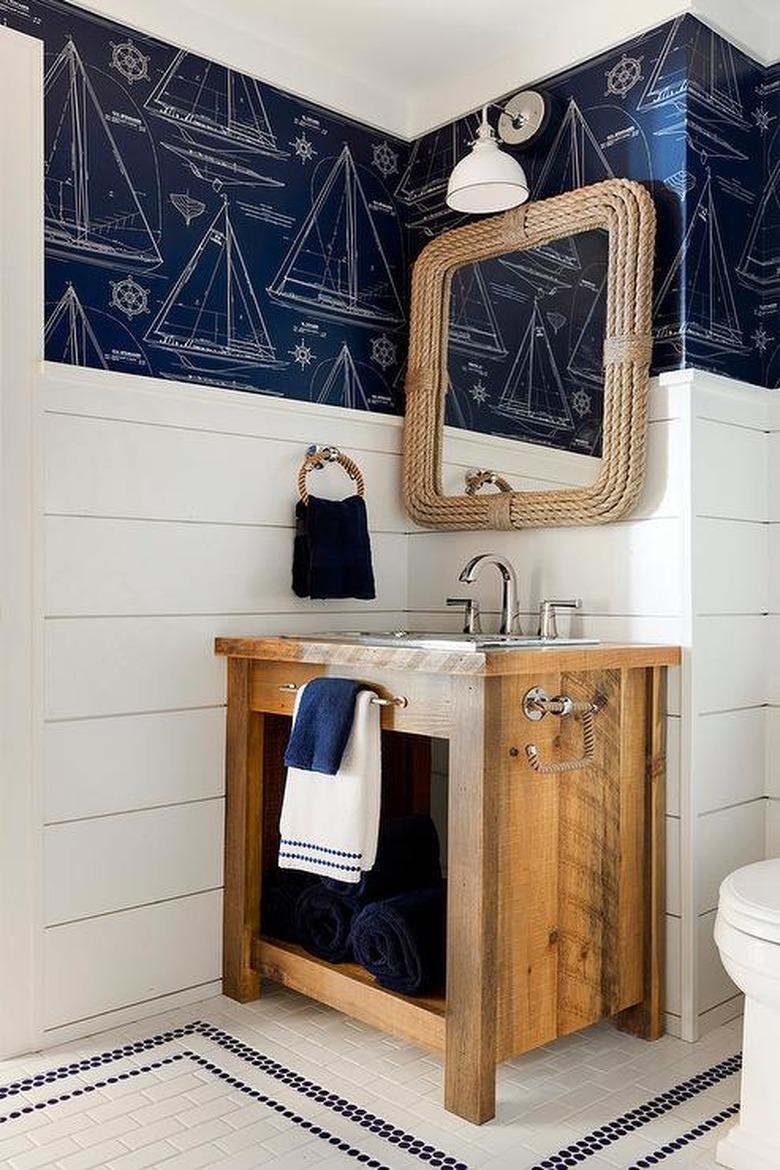 Bathroom with stainless steel bathroom sink by RLH Studio