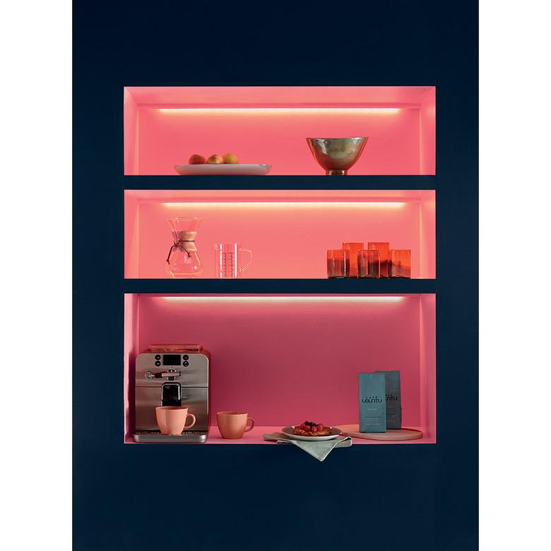 dishes in coral colored shelf