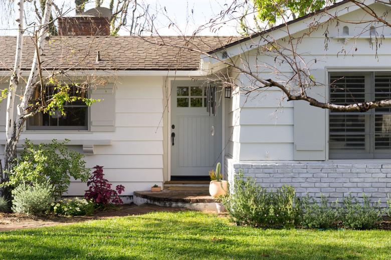 house seen from the outside with trees nearby