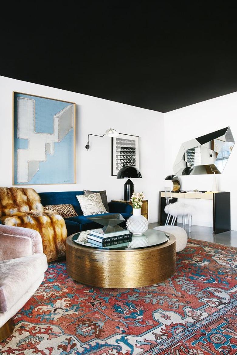 Elegant living room with matte black ceiling