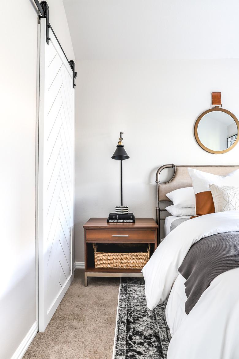 guest bedroom decorating idea with white barn door