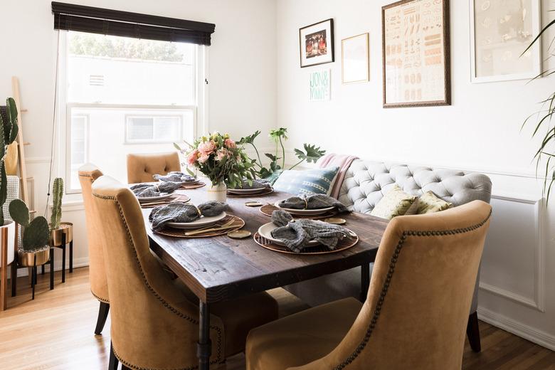 dining room with mustard chairs