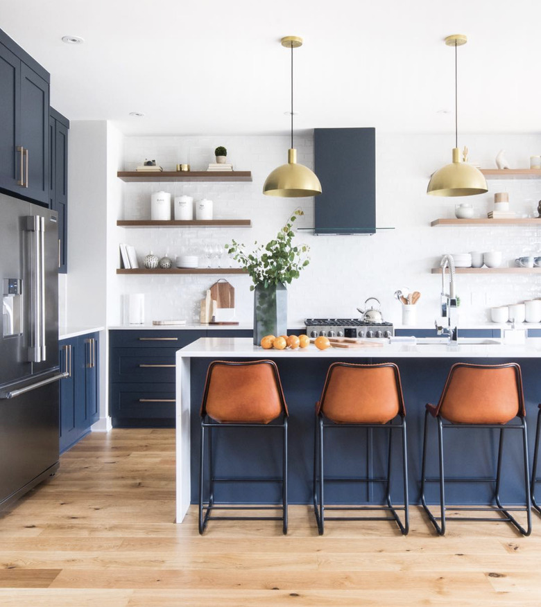 blue island with white waterfall countertop