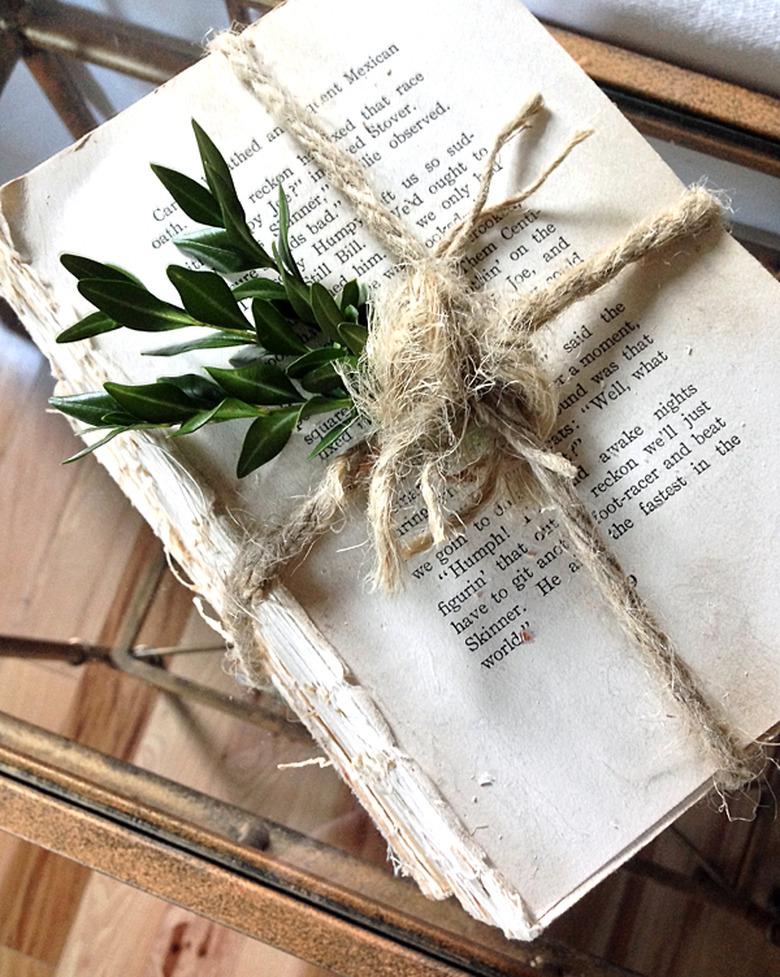 book without cover tied with twine