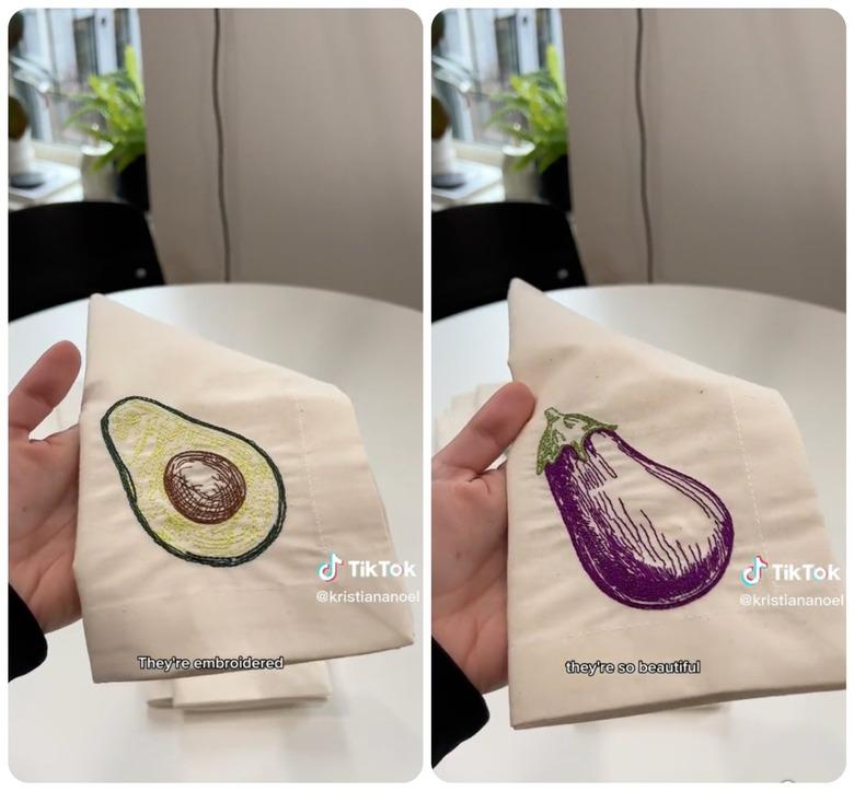 cotton napkins with an embroidered avocado and eggplant