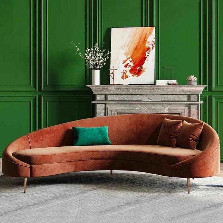 Orange velvet rounded couch