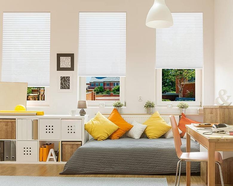 Pleated shades in a colorful living room