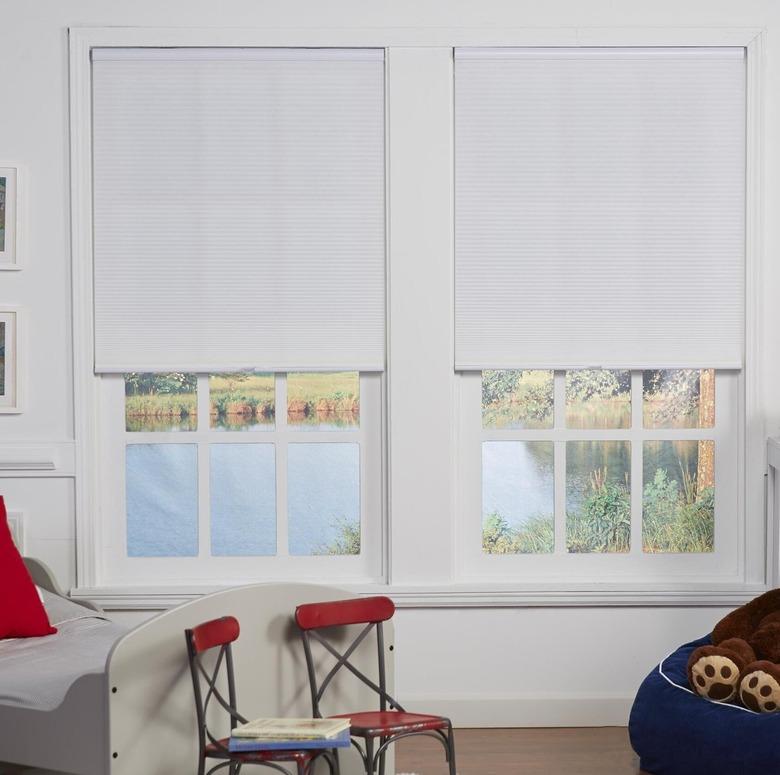 Semi-sheer cellular shades in a kid's bedroom