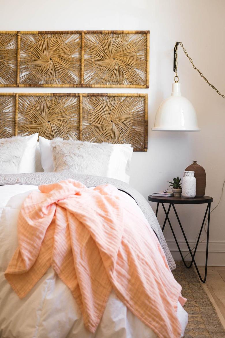 rattan headboard in vintage bedroom