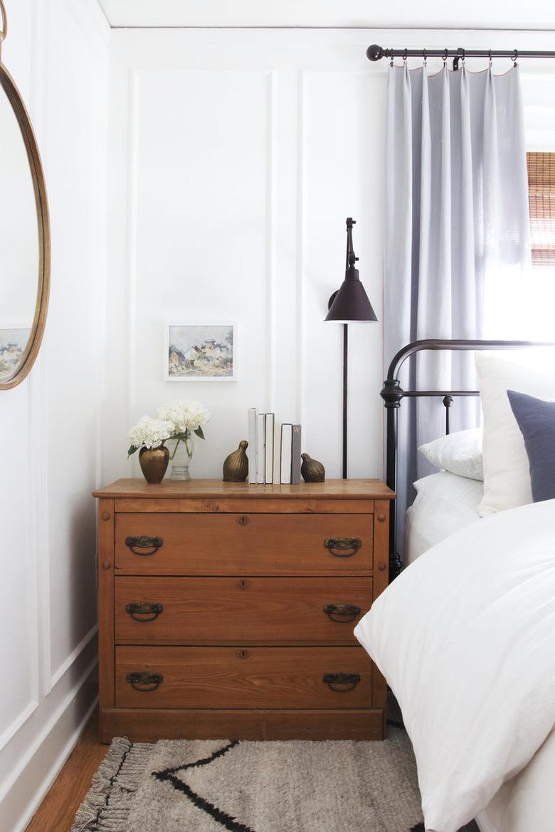 Vintage bedroom idea with vintage dresser