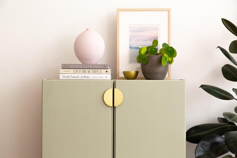 sage green cabinet