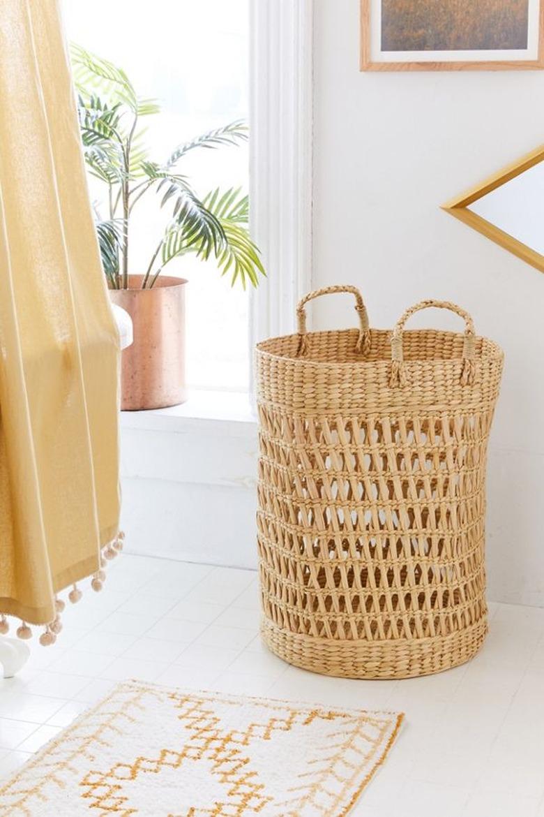 small bathroom storage ideas with  seagrass woven laundry basket