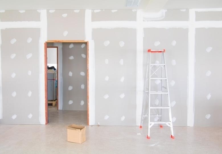 Gypsum board wall interior of home at construction site.