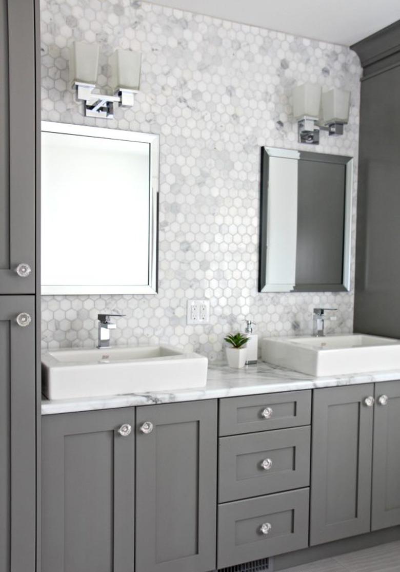 marble laminate bathroom countertops with marble mosaic tile backsplash and gray cabinets