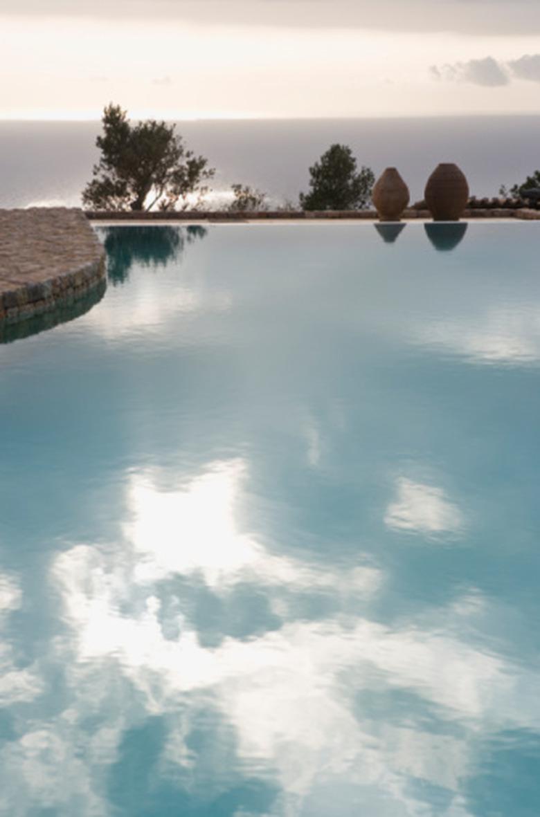 Swimming pool reflecting sky.