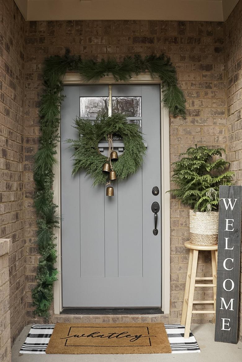 winter front porch with garland