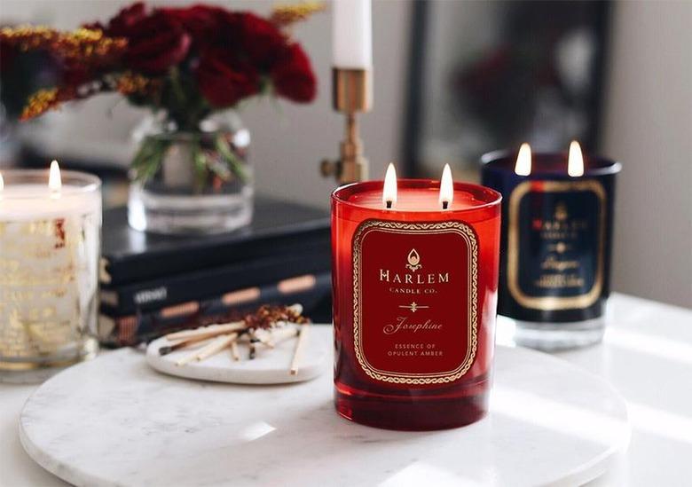 red and black candles on marble tray