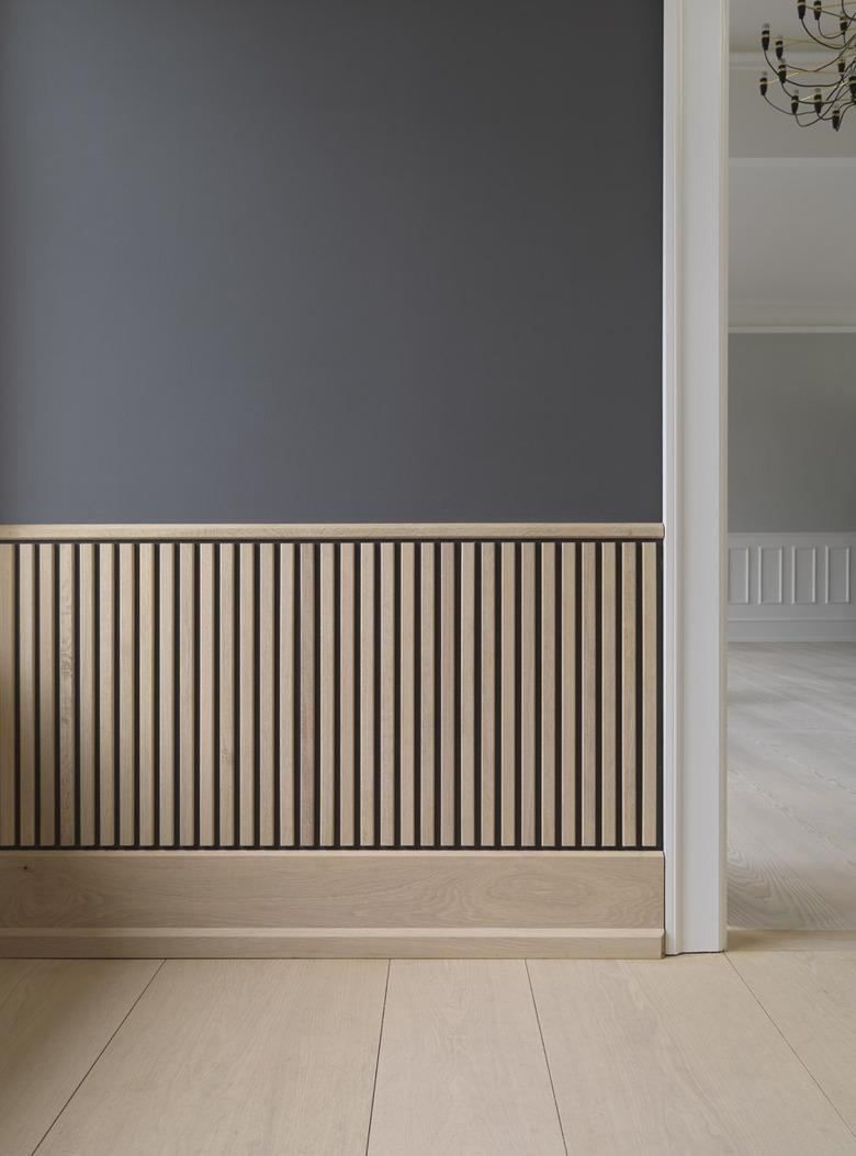 tall wood baseboards minimalist room