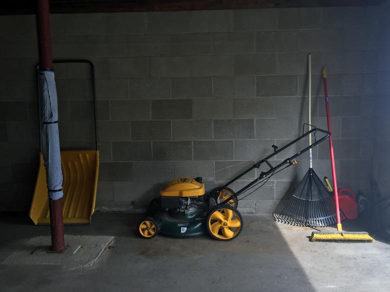 Lawn mower and other tools in the garage