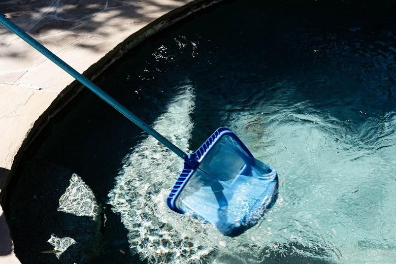 A pool skimmer goes into an in-ground pool