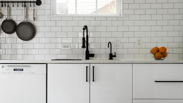 subway tile backsplash in white kitchen