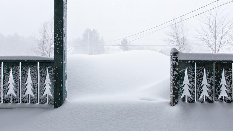 Porch covered in snowfall